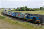 277 402-4 Bei der Fahrt mit Ihrem Containerzug in höhe Deichschäferei.  10/07/2016 Wilhelmshaven