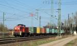 291 010-7 zieht einen Containerzug von Hamburg-Waltershof Richtung Rbf Alte-Sderelbe. Im Hintergrund versteckt die Khlbrandbrcke. Aufgenommen am 17.04.10.