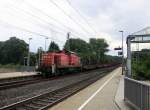 294 758-8 von Railion kommt mit Kurzen gemischten Güterzug aus Stolberg-Hbf(Rheinland) nach Herzogenrath und fährt durch Kohlscheid und fährt in Richtung Herzogenrath.
Bei Sonne und Regenwolken am Mittag vom 30.7.2015.