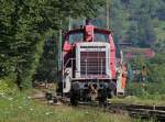 Die Werklok der Papierfabrik Scheufelen in Oberlenningen, 364 449-4, rangierte am 27.7.2012 im Lenninger  Gterbahnhof , nachdem kurz zuvor der bergabezug der DB angekommen war.