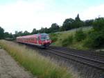 610 015 und 610 515 sind am 25.07.11 Richtung Marktredwitz unterwegs, hier bei der Durchfahrt in Neusorg.