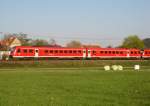 Ein 612er ist zusammen mit einem anderen 612er als RE nach Lichtenfels am 18.04.11 bei Gundelsdorf unterwegs.