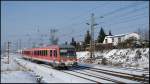 Bei bestem Winterwetter durchfährt 628 243 als RE 13057 von Stralsund nach Neustrelitz am 22.02.2013 den Abzweig Srg.