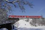 628 559 der Südostbayernbahn auf der Chiemgaubahn Prien - Aschau, kurz hinter der Abzweigung von der Hauptstrecke Rosenheim - Salzburg (3.2.15).