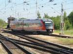 RE 8 nach Tessin mit 642 551 verlt am 9.6.2013 den Hbf Rostock.