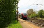 Die Euregiobahn (RB20) aus Düren-Hbf-Alsdorf-Poststraße und hält in Kohlscheid aus Richtung Aachen-West und fährt in Richtung Herzogenrath-Merkstein bei schönem