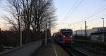 Die Euregiobahn (RB20) aus Heerlen(NL)-Stolberg-Hbf kommt die Kohlscheider-Rampe hoch aus Richtung Herzogenrath und hält in Kohlscheid und fährt in Richtung Richterich,Laurensberg,Aachen-West.
Am Morgen vom 5.1.2015.