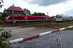 Im Archiv der mißlungenen Bilder gewühlt: Am 11.07.2014 fotografierte 648 768 beim Verlassen des Bahnhofes Niedersachswerfen vom angrenzenden Bahnübergang aus.
