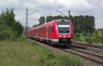 612 582 und ein weiterer 612er sind am 7. Juni 2011 als RE nach Wrzburg Hbf bei Ebensfeld unterwegs.