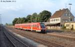 612 558 fährt am Abend des 5.9.12 als RE nach Schwandorf durch Luitpoldhütte. Bis Dezember 2004 waren hier noch zwei Rangierloks für den Amberger Güterverkehr stationiert. Seitdem liegen die weitläufigen Gleisanlagen weitgehend brach. 