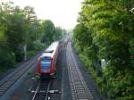 612 560 fährt als RE 3033 von Würzburg nach Hof, hier kurz nach dem Bahnhof von Oberkotzau.