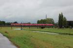 Nachdem das Hochwasser seit 3 Monate vorbei ist und wieder Normalitt eingekehrt ist habe ich noch mal ein Bild von der Flutrinne in Glauchau fotografiert und den Normalstand der Mulde zu zeigen. Zum Bild, ber die Brcke fahren zwei 612 mit dem RE 3787 nach Dresden Hbf. 