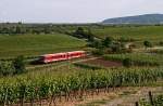 Am 31. Mai 2009 ist ein Ludwigshafener 628.2 als RB 28952 von Frankenthal nach Eiswoog zwischen Herxheim (Berg) und Kirchheim (Weinstrae) unterwegs.