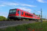 Der Triebwagen 628-928 857 auf der RB 12 von Templin Stadt nach Berlin-Lichtenberg bei der Fahrt am 30.05.2014 durch Nassenheide.