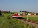 Der 628 626 als RB nach Traunstein am 12.06.2015 unterwegs bei Unteraschau.