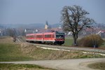 Nebenbahn-Romantik vor den Toren Münchens: Die sogenannte  Ludwig-Thoma-Bahn  von Dachau nach Altomünster war die einzige Strecke der Münchner S-Bahn, die nicht elektrifiziert gewesen ist. Zum Einsatz kamen Treibwagen der Baureihe 628.4 der Südostbayernbahn. Allerdings wurde die Strecke bis zum Fahrplanwechsel im Dezember 2014 komplett elektrifiziert und für einen 30-Minuten-Takt ausgebaut. Deswegen war es Anfang 2014 höchste Zeit, der Strecke noch einen Besuch abzustatten, bevor sie für Monate für die Bauarbeiten gesperrt wurde. Am 07. März 2014 gelang diese Aufnahme einer Doppelgarnitur 628.4 mit dem Ortsblick auf Markt Indersdorf.