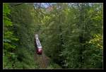 640 Doppel aus der Fahrt durch den wildromantischen Teil der Hönnetalbahn.
Im Hintergrund ist die Burg Klusenstein zu sehen.
Aufnahmestandort: Fußweg oberhalb des Binoler Tunnels.
Aufnahmetag: 03.08.2014