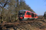 Am 02.03.2013 fährt 642 624  Liebliches Taubertal  als RE Hohenloheexpress Crailsheim-Heilbronn bei Neuenstein seinem nächsten Halte Öhringen Hbf entgegen. Im Hintergrund ist die Stadtkulisse von Waldenburg zu erkennen. 