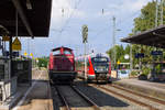 V 100 1365 der Bayernbahn und 642 096 als RB 58996 nach Pleinfeld am 04.08.2014 in Gunzenhausen.