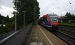 Zwei Euregiobahn (RB20) aus Heerlen(NL)-Stolberg-Altstadt-Düren kommt die Kohlscheider-Rampe hoch aus Richtung Herzogenrath und hält in Kohlscheid und fährt in Richtung Richterich,Laurensberg,Aachen-West.
Bei Regenwetter am Morgen vom 19.8.2014. 