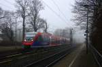 Zwei Euregiobahn (RB20) kommen aus Langerwehe-Stolberg-Altstadt nach Heerlen(NL) aus Richtung Aachen-West,Laurensberg,Richterich und hielten in Kohlscheid und fahren in Richtung Herzogenrath.
Bei Nebel und Nieselregen am Morgen vom 9.3.2015.