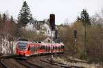 RE22 Ri. Trier Hbf (644 508) fhrt am 2. April 2010 um 11:18 Uhr in Kall ein