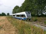 Nachschuss auf den bereits im Bild 117137 gesehen Zug am 23.07.2006 bei Bannemin Mlschow.