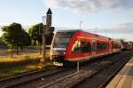 Hier 646 017-3 als RE6 (RE18616)  Prignitz-Express  von Berlin Spandau nach Wittenberge, bei der Ausfahrt am 14.6.2014 aus Neuruppin West.