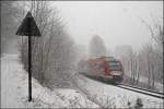 Kaum 30 Minuten Spter ist der Schnee in Ldenscheid angekommen. Ein 648er erklimmt als RB52 (RB 29283)  VOLMETALBAHN  die Steilstrecke zum Bahnhof Ldenscheid. (24.03.2008)
