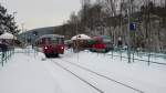 Zugkreuzung im Bahnhof Olbernhau: Ferkeltaxi-Sonderzug aus Neuhausen kreuzt mit RB 30871 der Erzgebirgsbahn. Sonderfahrt der Interessengemeinschaft Ferkeltaxi e.V. am 05.12.2010 auf der Flhatalbahn von Chemnitz nach Neuhausen im Erzgebirge. Es war die erste ffentliche Zugfahrt auf dem Streckenabschnitt Olbernhau-Grnthal - Neuhausen seit Einstellung des Personenverkehrs im Mai 2001. Der Zug bestand aus den Tw/Bw 172 171-1, 972 760-3 und 172 132-3.