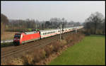 101084 ist hier am 18.2.2007 um 11.43 Uhr in Hasbergen mit einem Intercity in Richtung Münster unterwegs.
