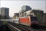 Das Mrklin H0 Vorbild 101 104 (9180 6101 104-6 D-DB) schlngelt sich mit dem CNL 1288  PYXIS , Mnchen Ost - Hamburg-Altona, durch das Hamburger Stadtgebiet und erreicht mit ca.