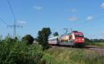 101 016-4 fuhr am 08.08.2012 mit dem IC 2332 von Norddeich Mole nach Kln, hier sdlich von Leer.