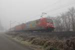 101er im Nebel. Da hngen mal zwei 101er an einem DB Autozug in Richtung Norden, die erste sogar noch eine Werbelok (101 037-0) und dann ist so ein Nebel... Aufgenommen am 22.11.2011 kurz hinter Eschwege West.