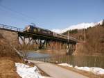 Am 13.Mrz 2012 befuhr 101-101 mit einem EC nach Graz die Ennstalbahn, hier an der Salzachbrcke bei Bischofshofen.