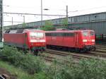 120 105-2 und 151 021-3 mit rotem Rahmen beides seltene Gste in Wanne-Eickel Hbf.