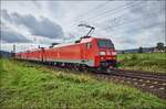 152 088-1+185 302-7+185 344-9+145 058-4+145 014-7 ist als Lokzug nach Bebra unterwegs,gesehen am 04.10.2017 bei Reilos.