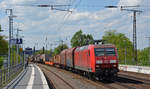 145 002 führte am 28.04.18 einen gemischten Güterzug durch Saarmund Richtung Schönefeld.