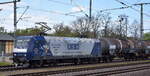 DB Cargo AG [D] (siehe DB Keks im Fenster) mit ihrer  145 019-6  [NVR-Nummer: 91 80 6145 019-6 D-DB] und Kesselwagenzug am 02.05.23 Vorbeifahrt Magdeburg Hbf.
