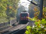 145 040-2 mit Flachwagenganzzug zwischen Werdau und Crimmitschau in Langenhessen am Kilometer 68,8, kurz nach dem Koberbachviadukt.
Aufnahmezeitpunkt: 11.10.2008 14:03