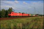 Railion 145 012-1 in Traktion mit DB 145 018-8 ziehen einen Containerzug (Berlin Wuhlheide, 24.06.2009)