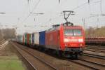 145 012-1 mit einem Containerzug in Dsseldorf Rath am 07.04.2010