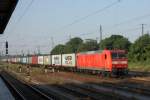 Mit einem langen Containerzug fhrt 145 031-1 durch Magdeburg Hbf in Richtung Magdeburg-Neustadt.