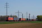 145 069-1 mit einem Containerzug in Neuss-Weienberg am 03.04.2011