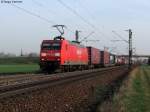 25.03.2011: Die 145 024-6 mit einem Containerzug Richtung Sden bei Graben-Neudorf.