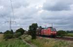 145 040-2 fuhr am 17.07.2012 mit einem Gterzug von Emden nach Osnabrck, hier sdlich von Leer.