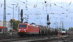 145 074-1 DB fhrt mit einem Kesselzug aus Antwerpen-BASF(B) nach Ludwigshafen-BASF bei der Ausfahrt in Aachen-West und fhrt in Richtung Kln in der Abendstimmung am 15.10.2012.