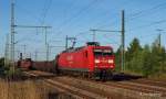 145 027-9 bringt ihren morgendlichen Gterzug am 22.07.13 durch Bad Oldesloe Richtung Lbeck.