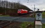 Mit einem gemischtem Güterzug ist hier die 145 046-9 bei trübem Wetter in Worringen gen Neuss fahrend unterwegs. 8.2.2014