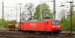 145 053-5 von Railion rangiert in Aachen-West. Aufgenommen vom Bahnsteig in Aachen-West bei Sonne und Wolken am Nachmittag vom 4.4.2014. 